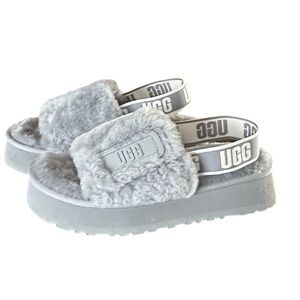 UGG Disco Slides Shoes cozy fluff and retro-style platform soles.